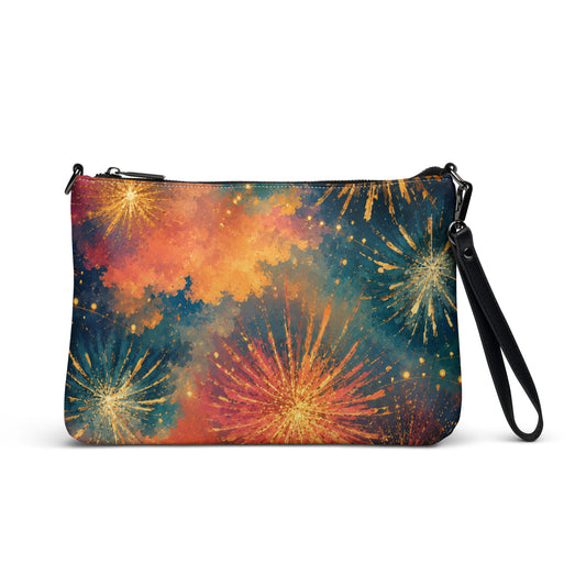 Fireworks all-over print crossbody bag in vegan faux leather, vivid watercolor fireworks in orange, coral, teal, and gold across the whole bag, dark gray hardware, No 925 made to order 4th of July crossbody