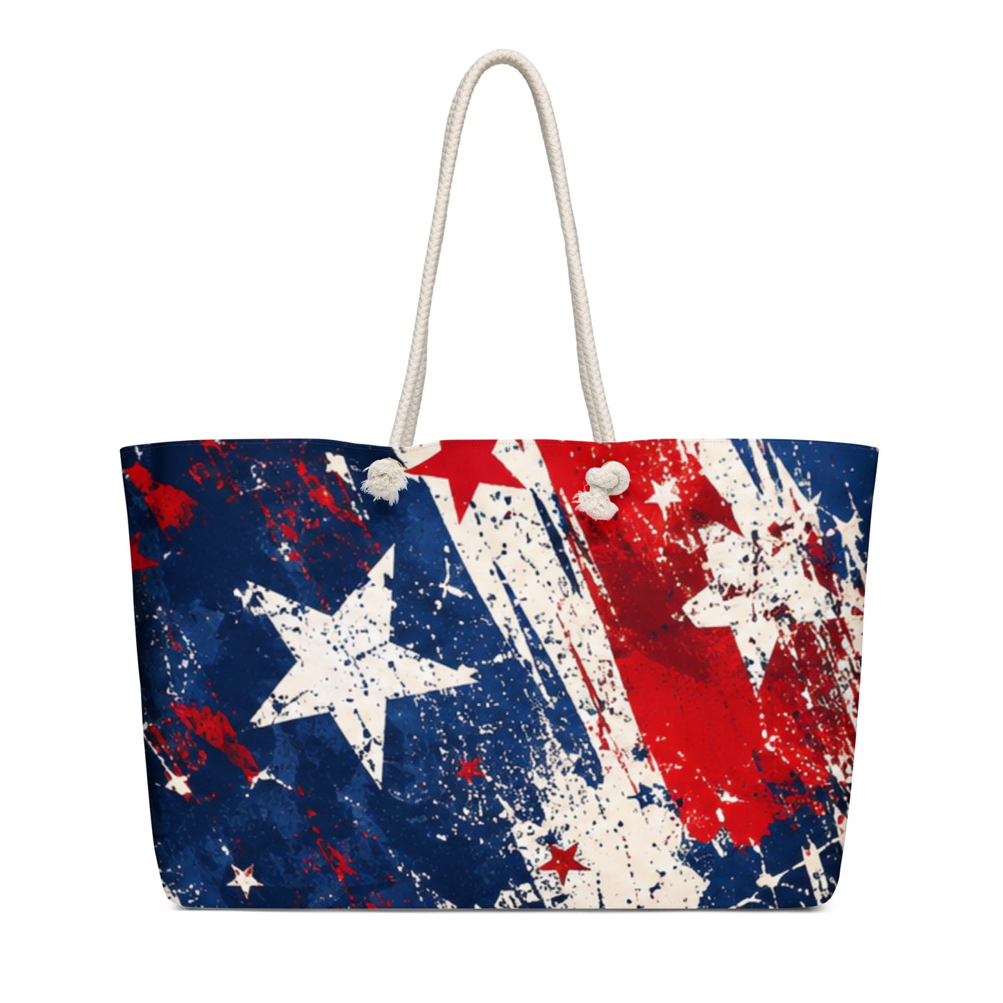 Grunge Stars and Stripes all-over print oversized weekender tote in distressed red, white, and blue with scattered stars and cream rope handles from No 925