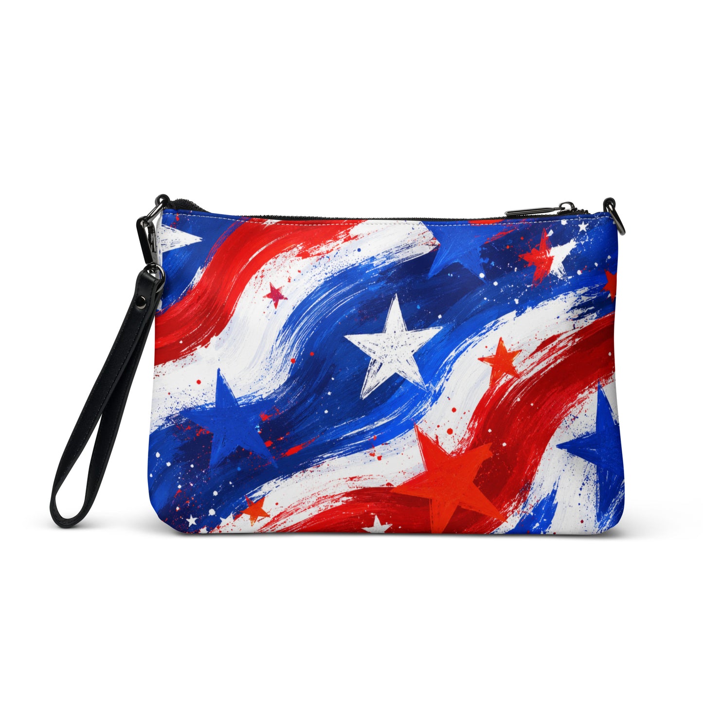 Stars and Stripes all-over print crossbody bag in painted red, white, and blue brushstrokes with scattered stars, black hardware and removable strap