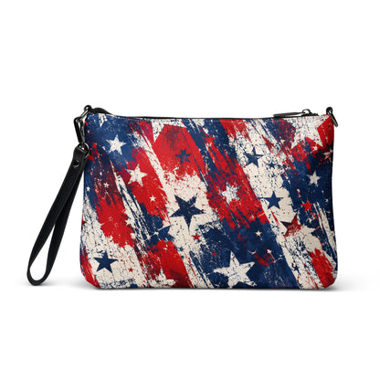 Grunge Stars and Stripes all-over print crossbody bag in distressed red, white, and blue with stars, black hardware and removable strap from No 925