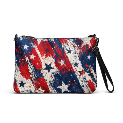 Grunge Stars and Stripes all-over print crossbody bag in distressed red, white, and blue with stars, black hardware and removable strap from No 925