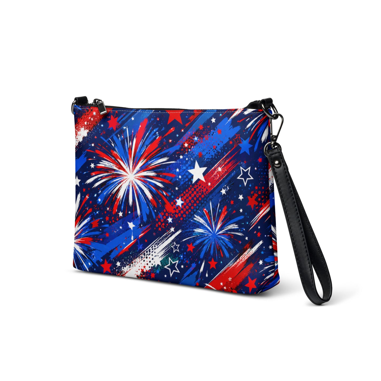Star-Spangled Sky all-over print crossbody bag with red, white, and blue fireworks bursts and stars on deep navy, black hardware and removable strap