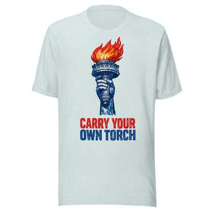 Carry Your Own Torch patriotic graphic tee in ice blue, Statue of Liberty torch with red flame and navy slogan from No 925