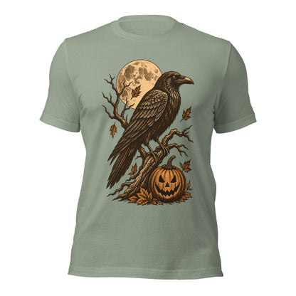 Sage green midnight omen halloween unisex t-shirt with a raven perched on a branch above a jack-o-lantern under a full moon