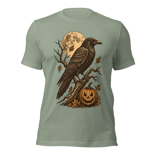 Sage green midnight omen halloween unisex t-shirt with a raven perched on a branch above a jack-o-lantern under a full moon