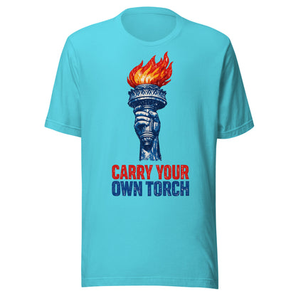 Carry Your Own Torch patriotic graphic tee in turquoise, Statue of Liberty torch with red flame and navy slogan from No 925