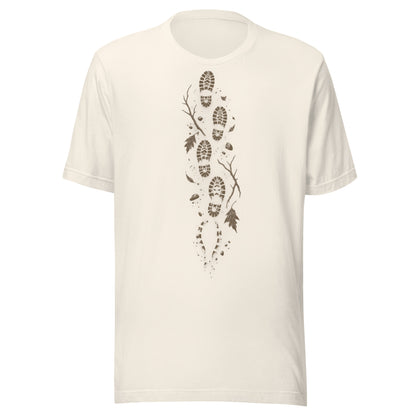 No Way Back t-shirt in vintage white with a vertical muddy bootprint trail through twigs and leaves centered on the chest