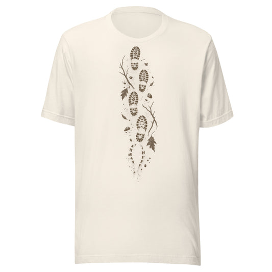 No Way Back t-shirt in vintage white with a vertical muddy bootprint trail through twigs and leaves centered on the chest