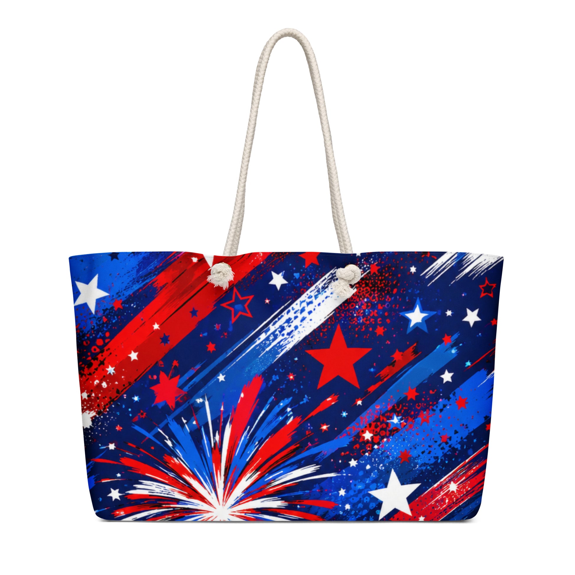 Star-Spangled Sky all-over print oversized weekender tote with red, white, and blue fireworks bursts and stars on deep navy and cream rope handles
