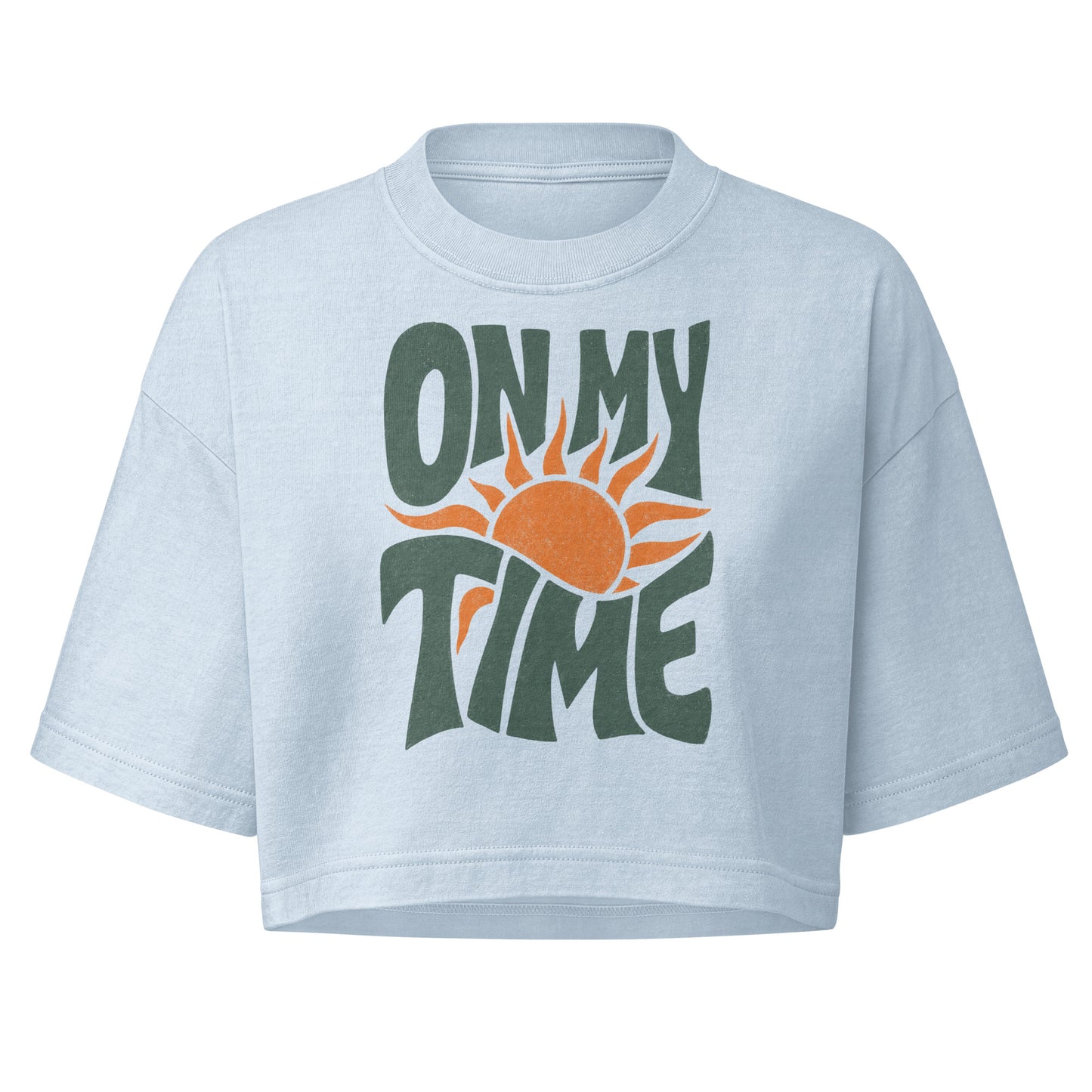 On My Time garment dye cropped tee with ON MY TIME in dark green retro lettering wrapped around an orange rising sun