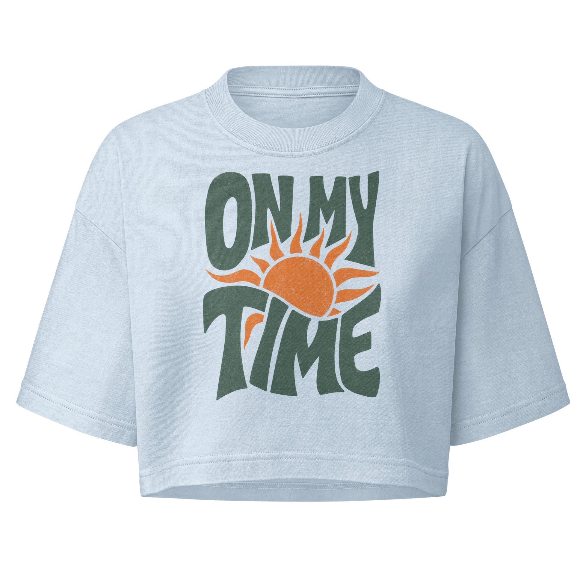 On My Time garment dye cropped tee with ON MY TIME in dark green retro lettering wrapped around an orange rising sun