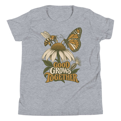 Good Grows Together Youth T-Shirt, front view with a bee and orange butterfly visiting a flower above GOOD GROWS TOGETHER lettering