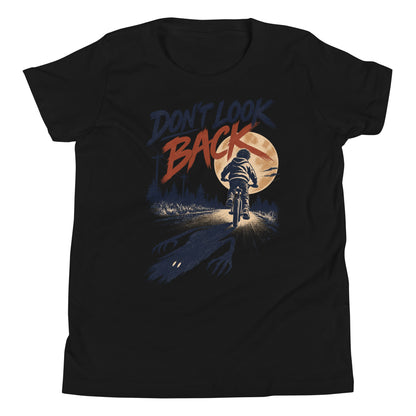 Don't Look Back youth t-shirt with a child riding a bicycle at sunset while a long clawed shadow follows on the road in black, front view