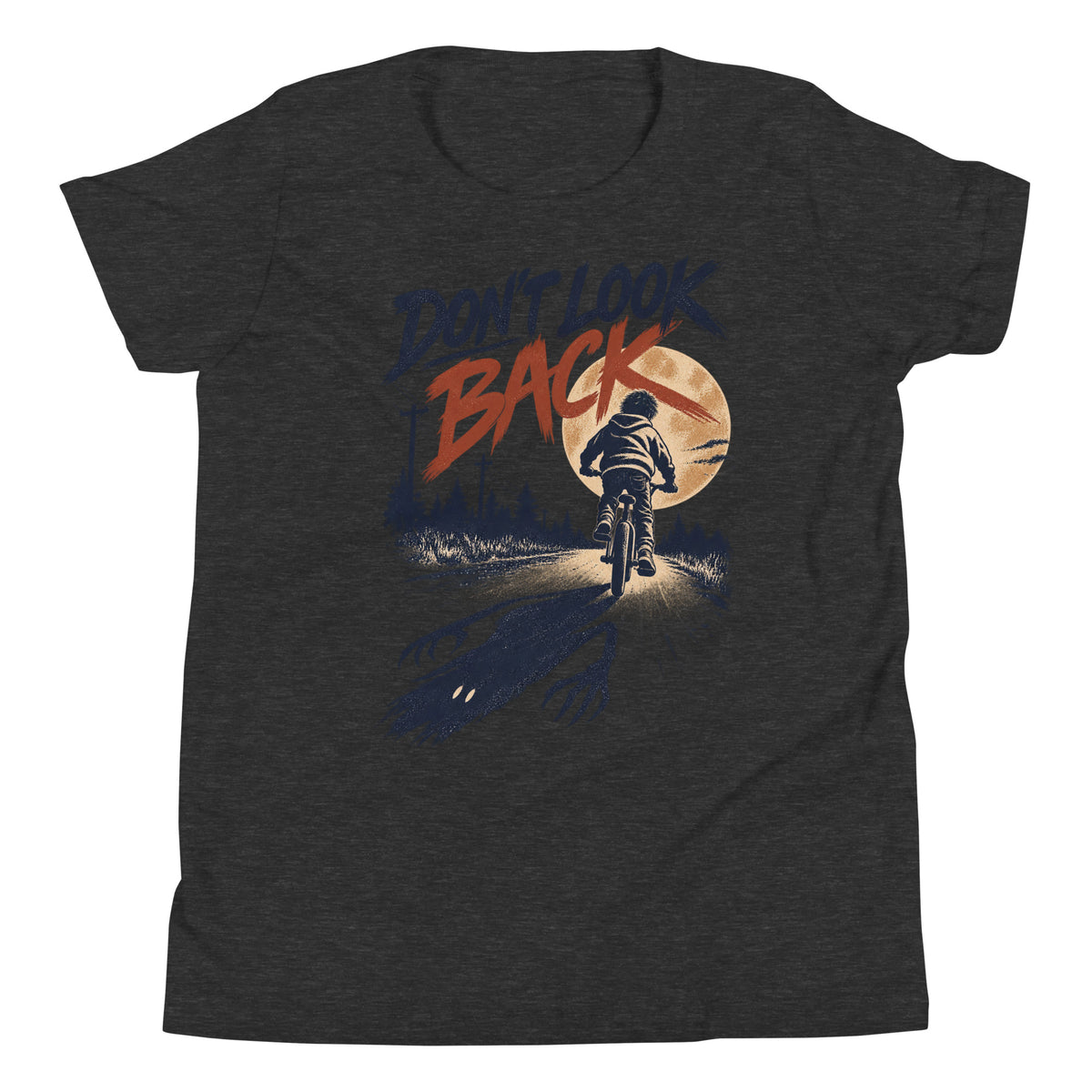 Don't Look Back youth t-shirt with a child riding a bicycle at sunset while a long clawed shadow follows on the road in dark grey heather, front view