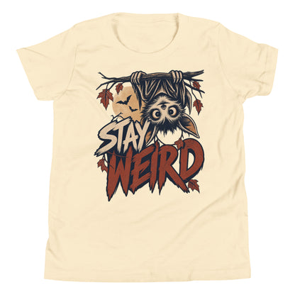 Stay Weird youth t-shirt with a wide-eyed bat hanging upside down from a branch under a full moon in natural, front view