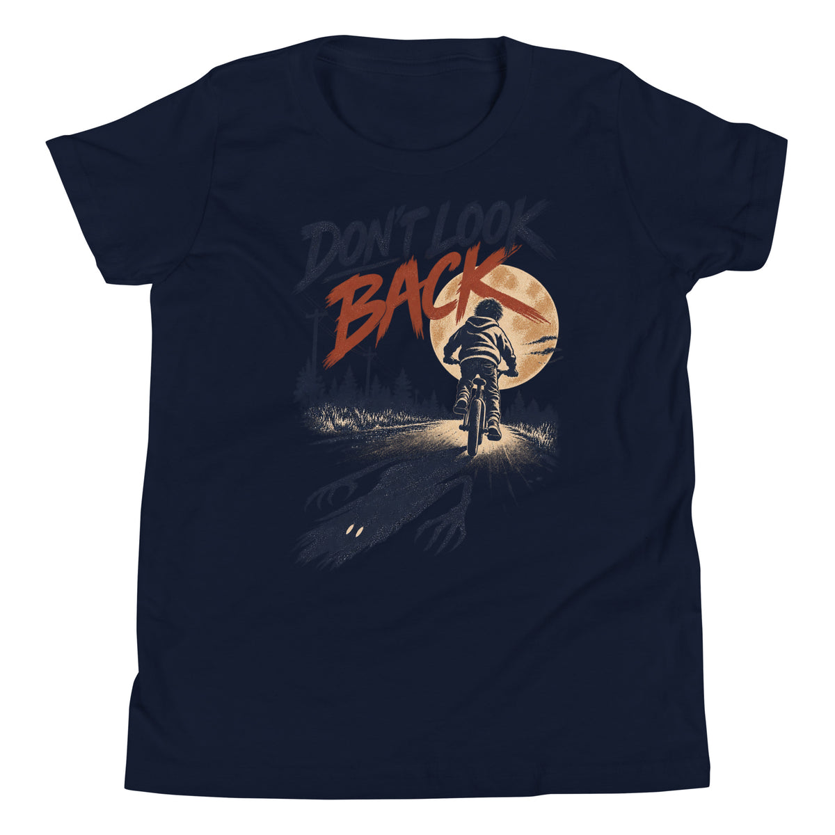 Don't Look Back youth t-shirt with a child riding a bicycle at sunset while a long clawed shadow follows on the road in navy, front view